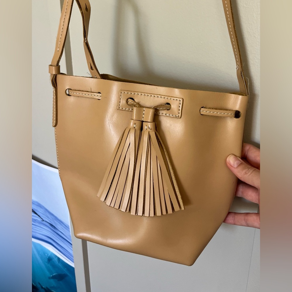 J. Crew beige tan neutral leather medium bucket bag crossbody with tassel